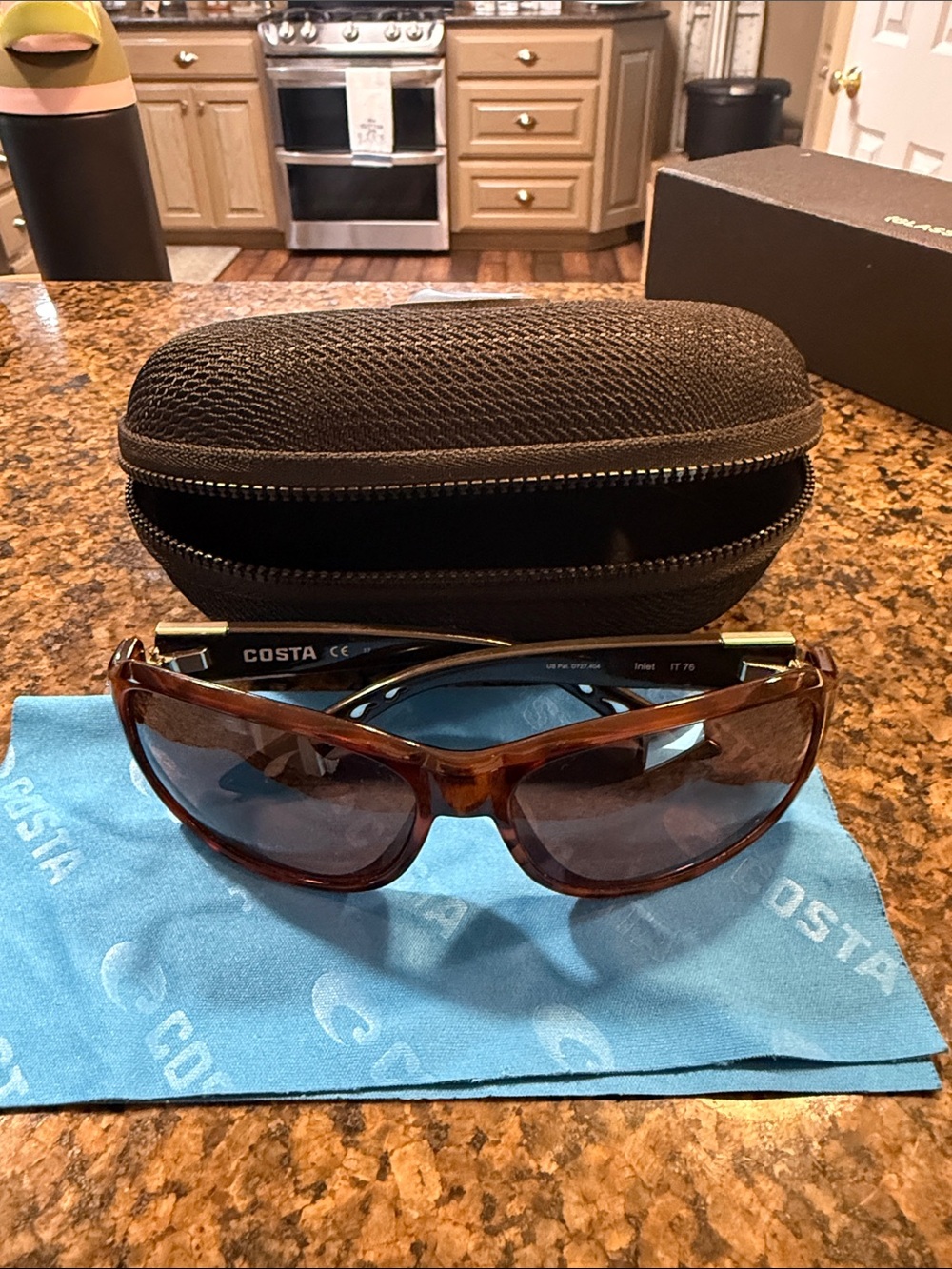 Costa Brown Tortoise Sunglasses with Dark Lenses